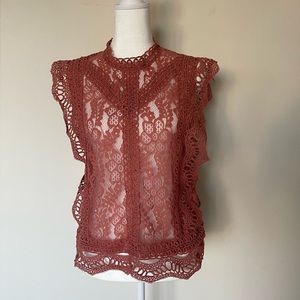 Cute Lace top that has lots of feminine details.